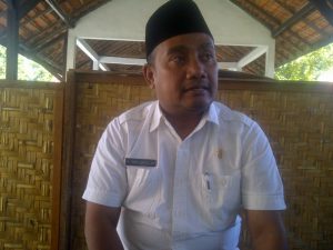 Ketua DPRD Sampang, Imam Ubaidillah saat diwawancarai mengenai temuan BPK terkait BUMD