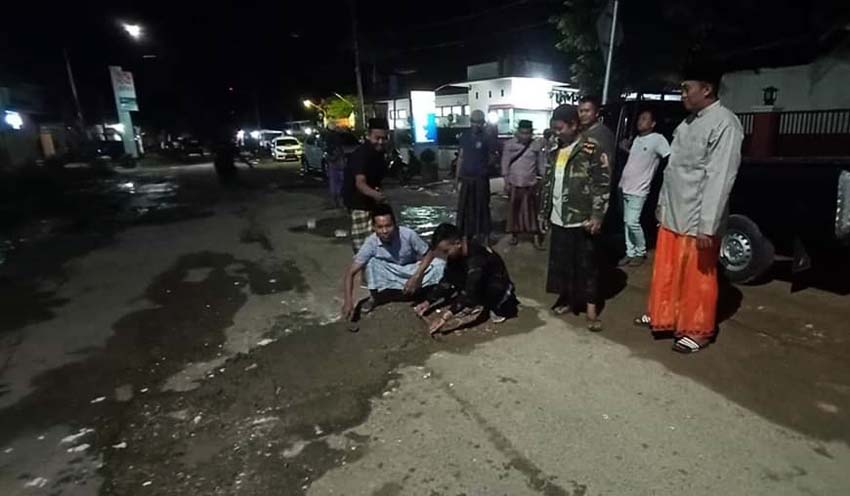 Keduakalinya, Ansor Ambunten Tambal Sulam Jalan Nasional depan Kantor Kecamatan